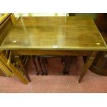 Vintage mahogany writing table on reeded tapering supports