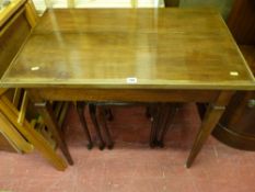 Vintage mahogany writing table on reeded tapering supports