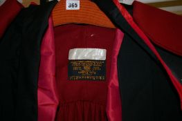 Courtroom robe by Ede & Ravenscroft Ltd etc and a vintage dress
