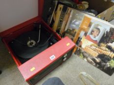 Fidelity portable turntable system with a small collection of vinyl records