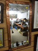 Copper framed bevelled wall mirror