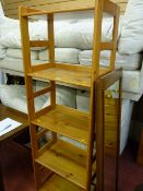 Modern pine open shelving unit and a vintage mahogany framed mirror