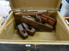 Wooden box containing vintage block planes