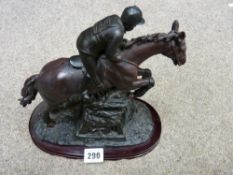 Composite figure of a jockey on a horse