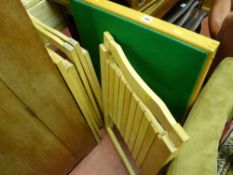 Baize topped card table and four light wood folding chairs