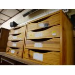 Two sets of wooden drawers