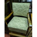 Vintage well re-upholstered and polished oak armchair