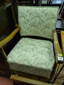 Vintage well re-upholstered and polished oak armchair