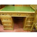 Excellent reproduction pine twin pedestal desk with green gilt tooled leather top