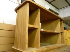 Modern pine bed head, woollen rug and a reproduction pine entertainment stand