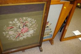 Two tapestry firescreens, one Art Deco shaped and a timber framed wall mirror