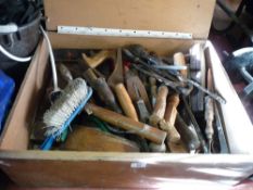 Selection of hand tools in a wooden box