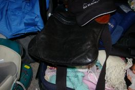 Suitcase containing miscellaneous linen, soft toys, walking boots by Vibram, handbags etc