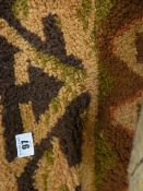 Large woollen patterned carpet