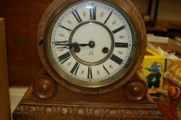 Carved front polished mantel clock
