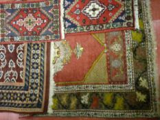 Quantity of patterned woven rugs