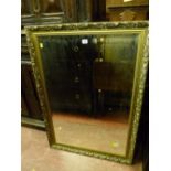 Modern gilt framed bevelled edge wall mirror