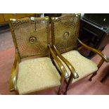 Pair of polished vintage Bergere back armchairs
