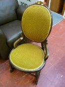 Victorian spoonback and upholstered rocking chair, now on castors
