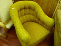 Vintage button backed upholstered armchair