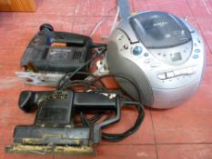 Black & Decker jigsaw and a sander and a Roberts CD portable stereo E/T