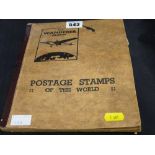 'The Wonderer' stamp album with quantity of worldwide stamps