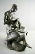 A MEUNIER BRONZE SCULPTURE of a woman breastfeeding her child (Femme Allaitant Son Enfant),