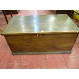 AN ANTIQUE OAK LIDDED CHEST with interior candle tray and iron strap hinges and lock, dovetail