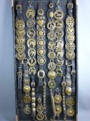 SHIRE/HEAVY HORSE BRASSWARE - a 4ft display board of Victorian and later martingales and other brass