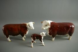A BESWICK POTTERY ABERDEEN ANGUS BULL and a Beswick pottery Aberdeen Angus cow, each marked '
