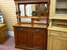 AN EDWARDIAN MAHOGANY MIRROR BACKED CHIFFONIER, the multiple mirrored back with shelf and turned and