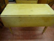 A VICTORIAN STRIPPED PINE PEMBROKE TABLE, twin flap rectangular top with single end drawer on turned