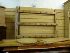 A VINTAGE PINE WITH IRON HOOKS RACK, a bread oven board and one other and a long pine panel, 86 x