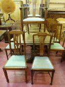 A LARGE OAK REFECTORY DRAW LEAF DINING TABLE & TEN DINING CHAIRS, the table on substantial bulbous