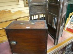 A MAHOGANY SINGLE DOOR CABINET and a small Eastern brass inlaid three fold screen