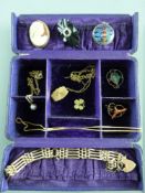 AN EDWARDIAN JEWELLERY CASE & CONTENTS including a nine carat gold locket and chain with two further