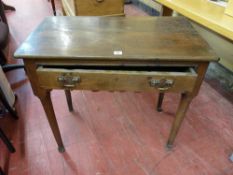 AN ANTIQUE OAK SINGLE DRAWER SIDE TABLE, rectangular topped on circular tapering supports, detail to