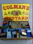 A VINTAGE HORNBY DUBLO TRAIN SET in a Coleman's Mustard box including a 9596 LNER locomotive,