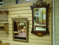 A GEORGIAN STYLE MAHOGANY WALL MIRROR with gilt phoenix top and Sheraton shell inlay lower detail,