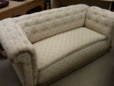 A GOOD VINTAGE CHESTERFIELD STYLE SETTEE in modern button back upholstery with drop arm end