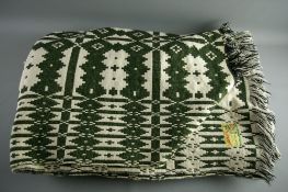 A LARGE VINTAGE WELSH WOOLLEN BLANKET with Brynkir label, traditional double sided pattern in