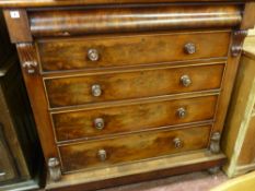 A VICTORIAN MAHOGANY SCOTTISH STYLE CHEST of five long drawers with carved corbel front decoration