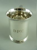 A SILVER PRESENTATION/CHRISTENING TANKARD, London 1945, 6.6 troy ozs, 10 cms high with monogrammed