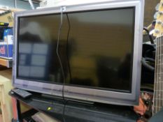 Panasonic flatscreen TV and stand E/T