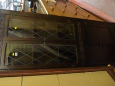 Priory style oak corner cabinet with leaded glass doors