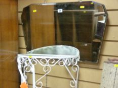 Vintage wall mirror and a glass topped wrought iron hall table
