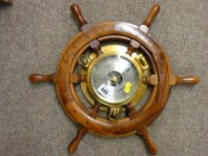 Vintage style ship's wheel with central brass barometer