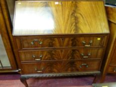 Good reproduction mahogany fall front bureau with carved lower moulding on ball and claw supports