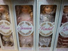 Eight boxed 'Classique Collection' porcelain dolls
