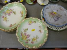 Limoges set of porcelain plates and bowls, fruit decorated wall plate and one other
